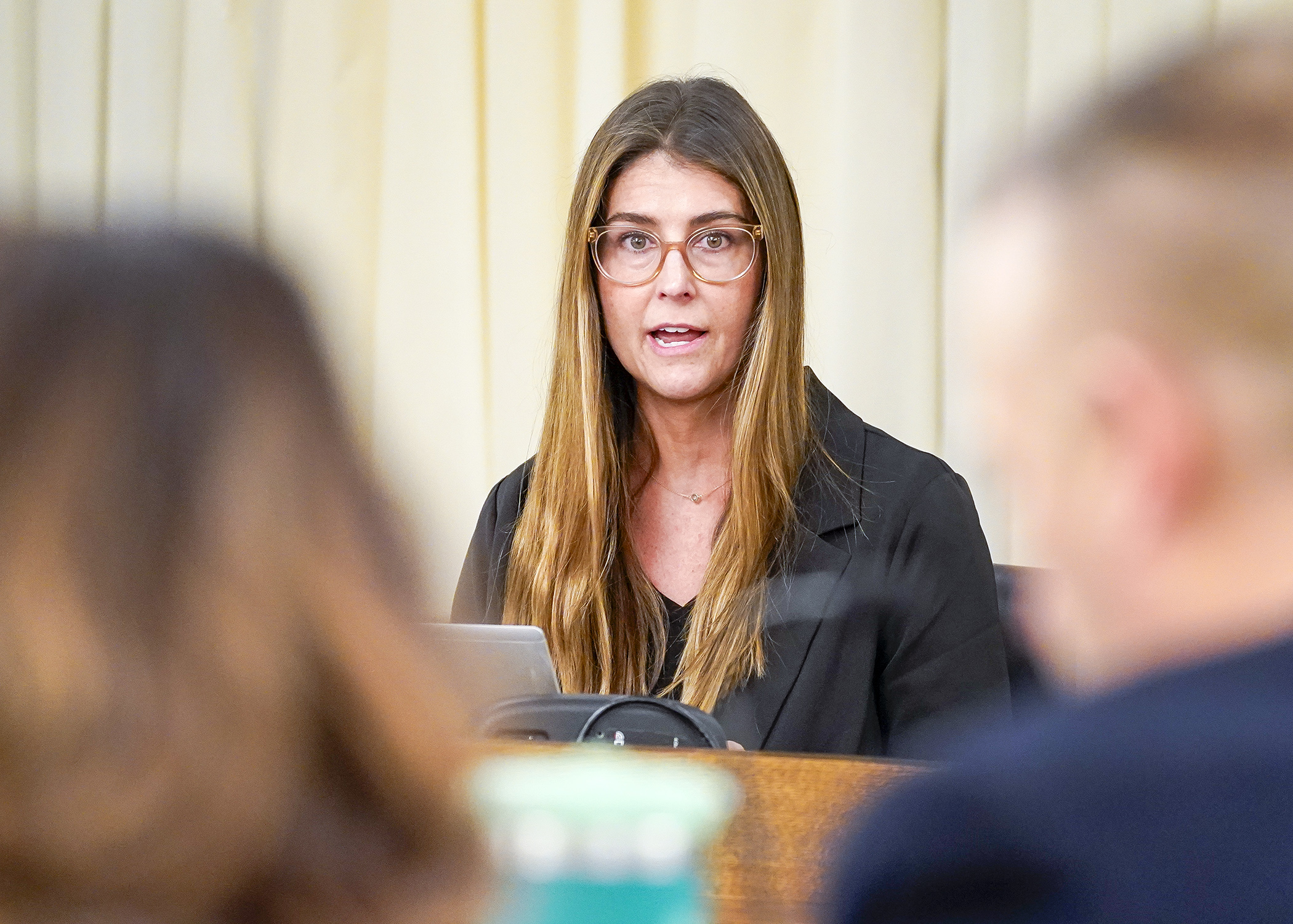 Lauryn Schothorst of the Minnesota Chamber of Commerce testifies before the House's workforce and labor committee Thursday about the impacts of earned sick and safe time, paid family leave, and labor shortages. (Photo by Andrew VonBank)